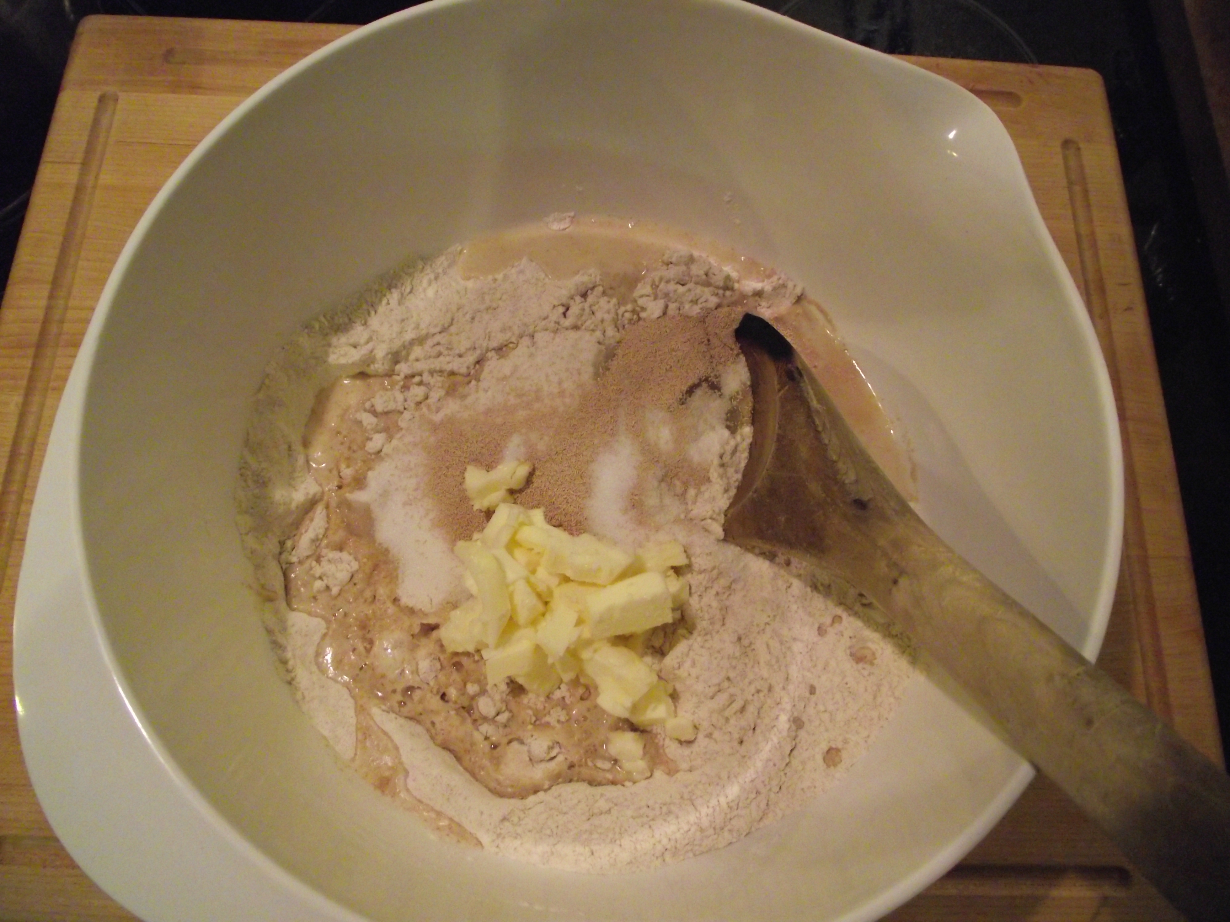 https://bakethiscake.files.wordpress.com/2011/10/stirring-bread-ingredients-with-a-wooden-spoon.jpg