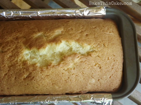 Sour Cream Pound Cake overhead in a bread pan Bake This Cake